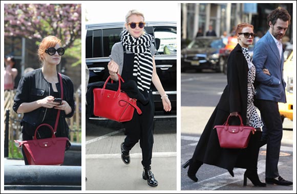 Jessica Chastain and Emma Roberts wearing the Longchamp Le Pliage® Héritage, their new favorite handbag